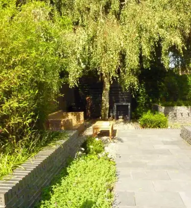 images/mes/2 moderene tuinen tuin bestraten met natuursteen hovenier tilburg-390x424-c95