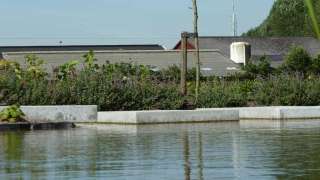 vijver met betonsteen in waspik hovenier tilburg 